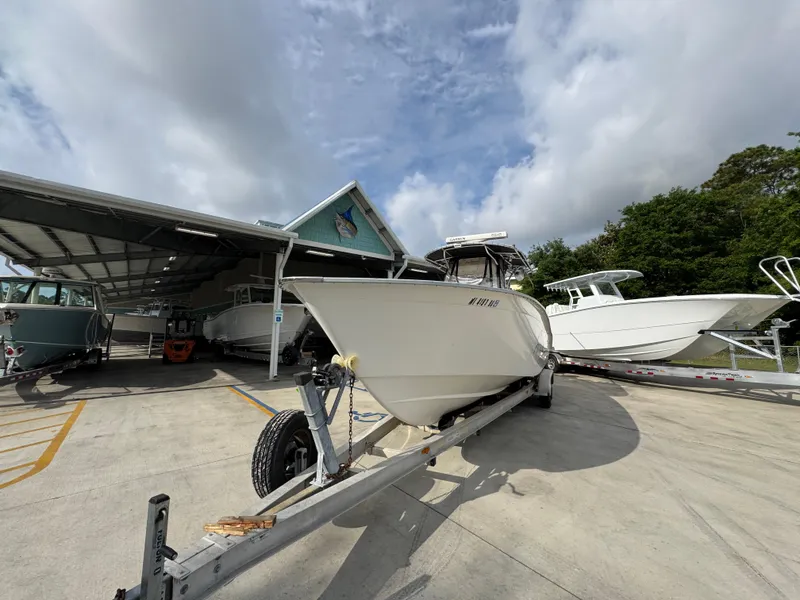 Slide: The Image of 2006 Cape Horn 31 T boat on trailer under cloudy sky. - 5