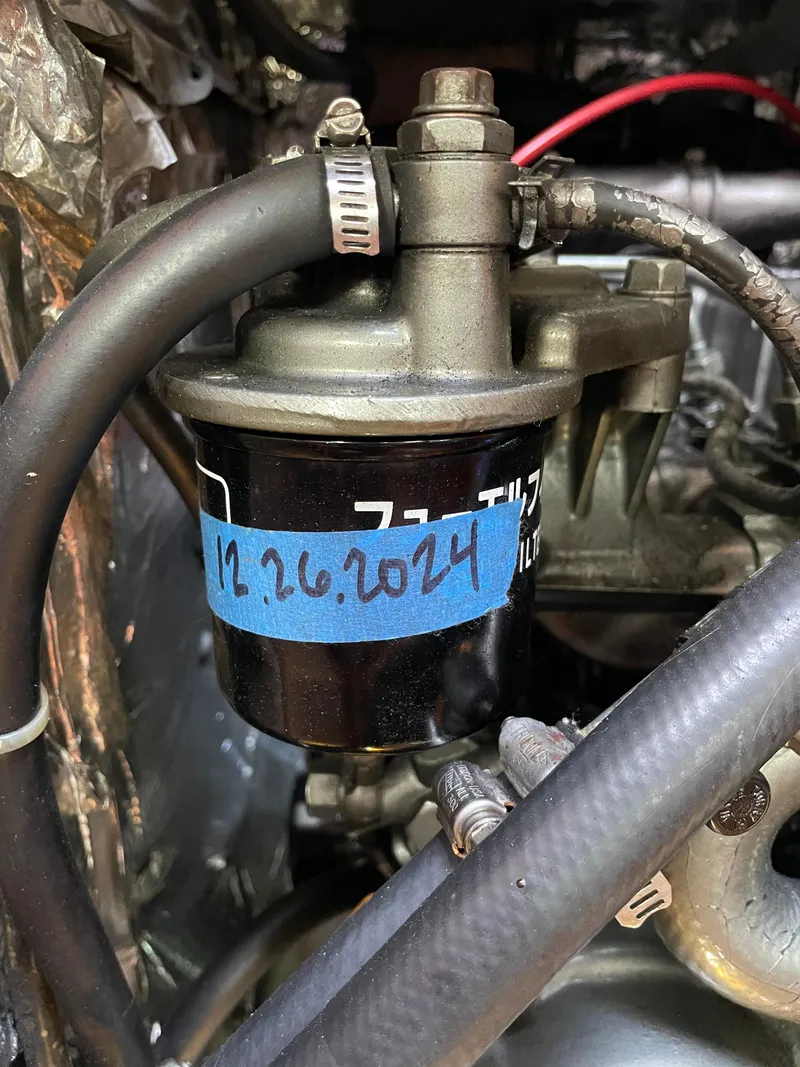 Slide: The Image of Fuel filter of a 1994 Beneteau Oceanis 440 sailboat, labeled "12.26.2024". - 21
