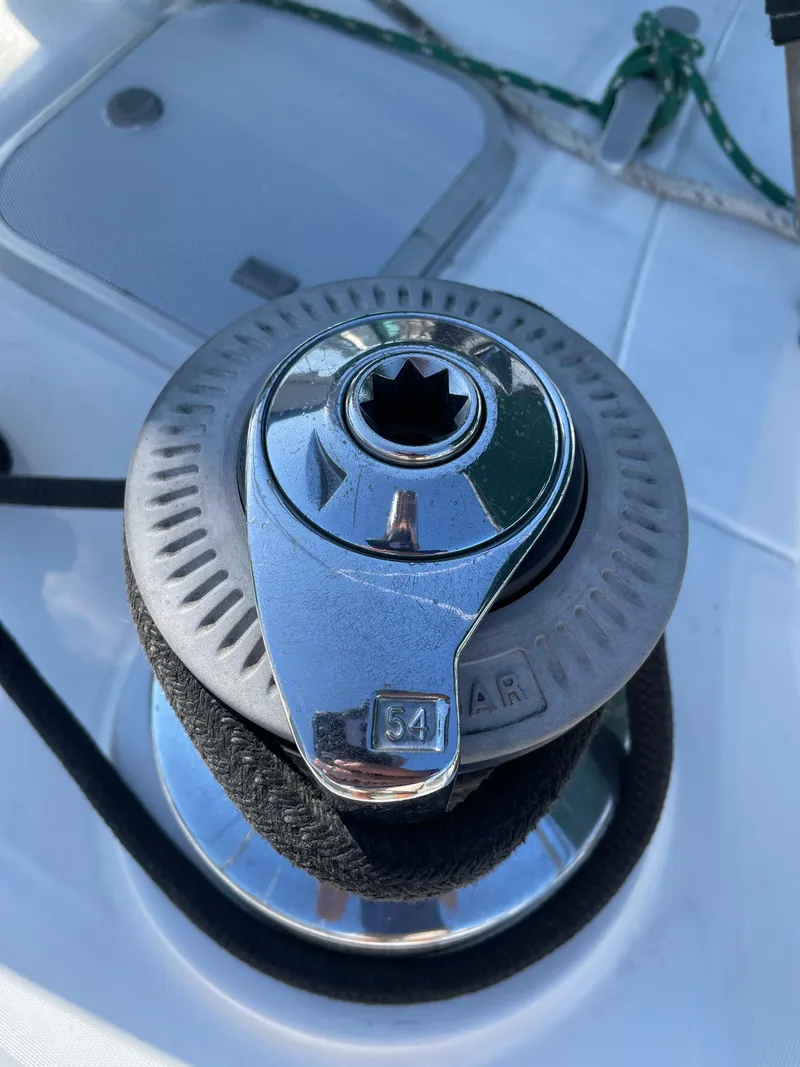 Slide: The Image of Close-up of a winch on a 1994 Beneteau Oceanis 440 sailboat deck. - 31