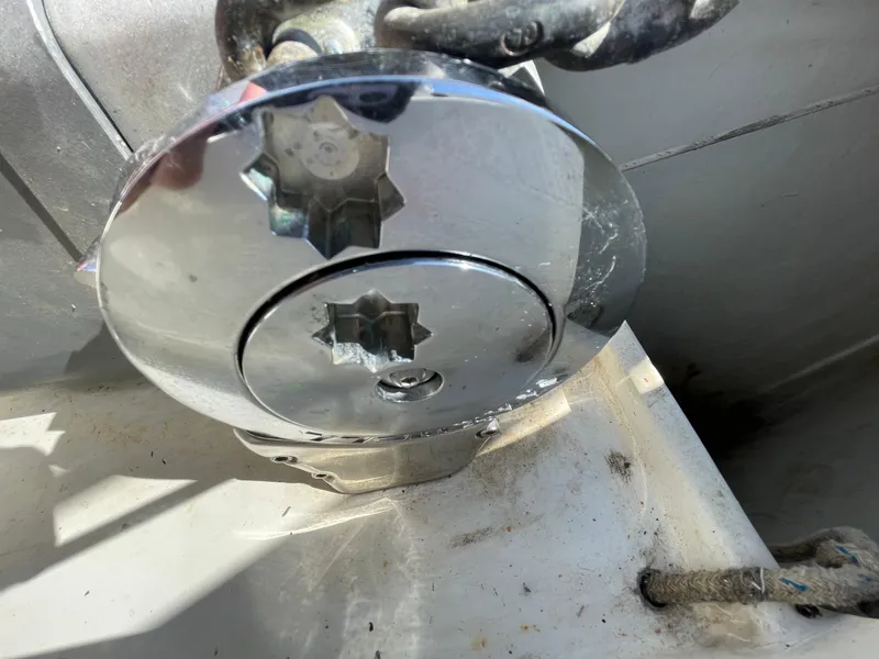 Slide: The Image of Chrome winch on 1994 Beneteau Oceanis 440 sailboat deck. - 32