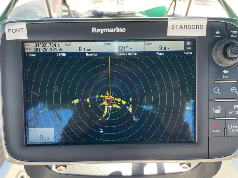Slide: The Image of Raymarine navigation display on a 1994 Beneteau Oceanis 440 sailboat. - 39