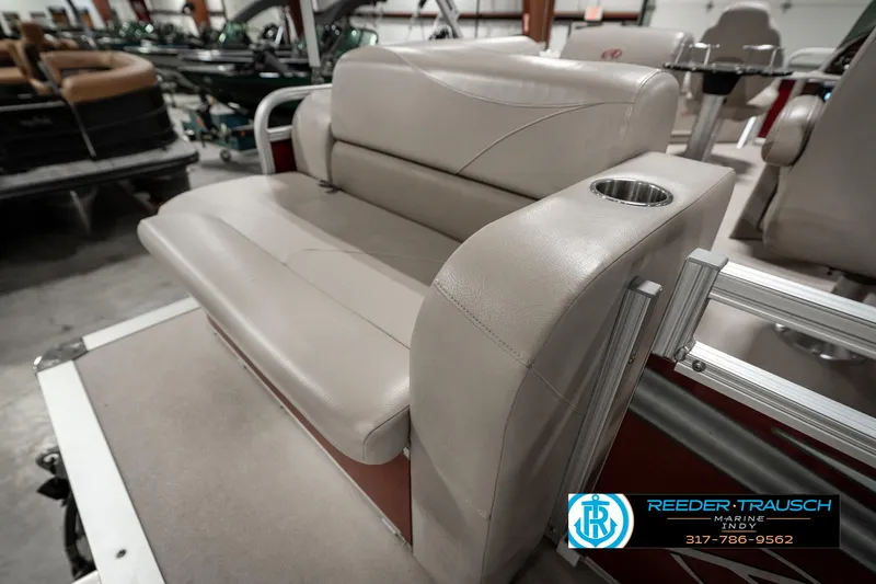 Slide: The Image of 2019 Avalon Eagle boat seat with cup holder in showroom. - 23