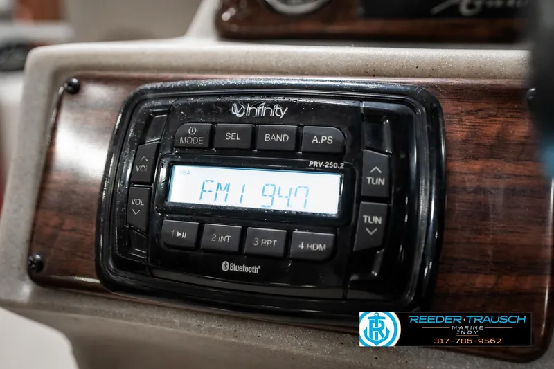 Slide: The Image of Infinity radio display in a 2019 Avalon Eagle, tuned to FM 94.7, with Bluetooth feature. - 28