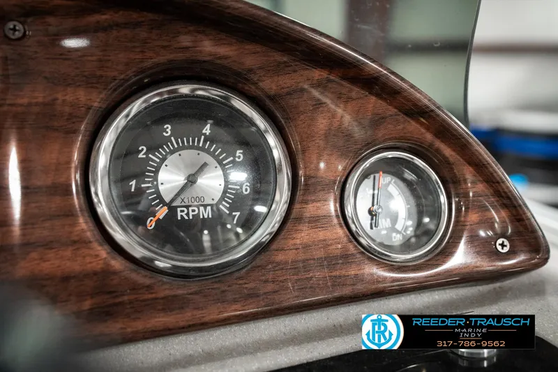 Slide: The Image of Close-up of 2019 Avalon Eagle dashboard with RPM gauge and wood finish. - 30