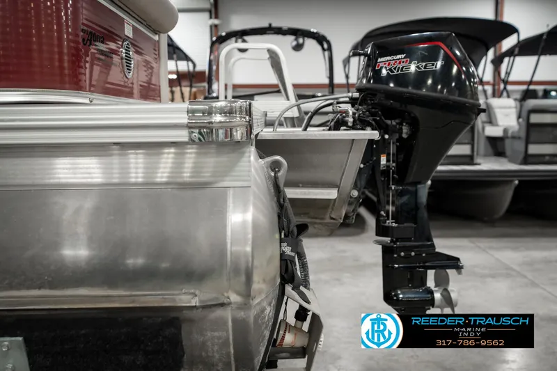Slide: The Image of 2019 Avalon Eagle boat with Mercury outboard motor in showroom. - 40