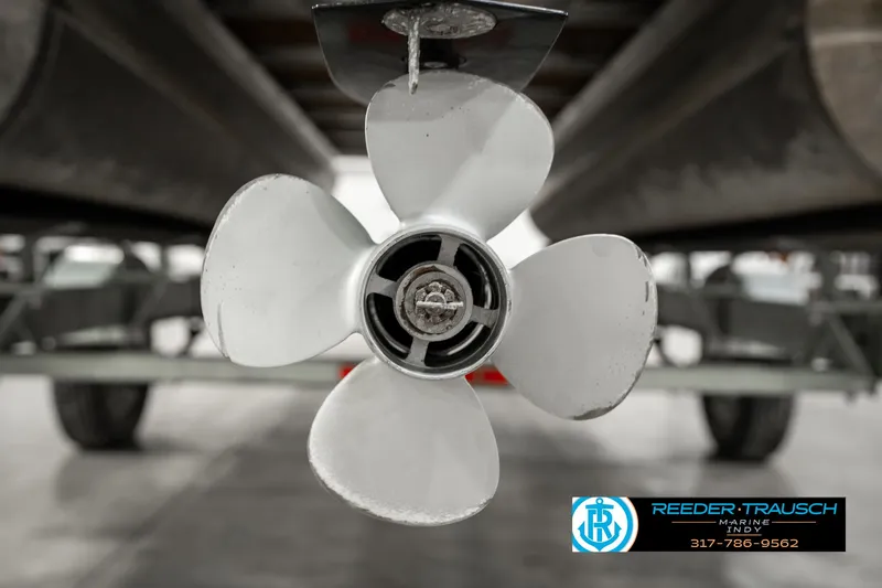 Slide: The Image of Propeller of a 2019 Avalon Eagle boat on a trailer, close-up view. - 43