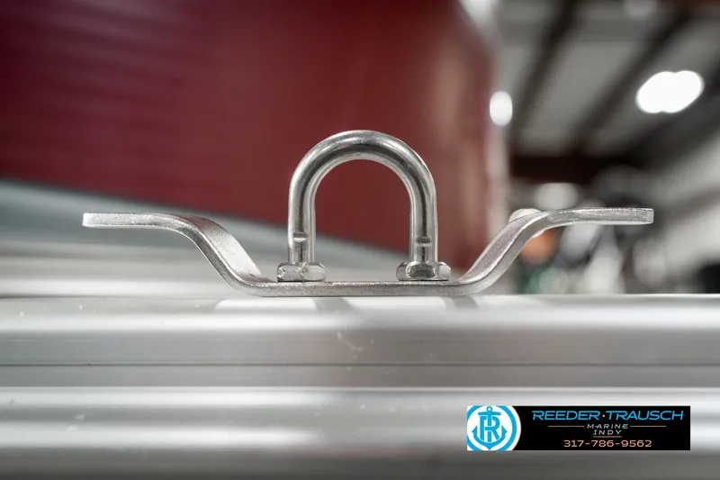 Slide: The Image of Metal U-bolt clamp on Avalon Eagle 2019, industrial setting, Reeder-Trausch branding visible. - 44