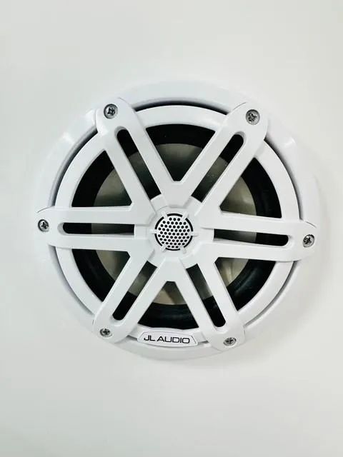 Slide: The Image of White JL Audio speaker on 2025 Sportsman Open 232 Center Console boat. - 14