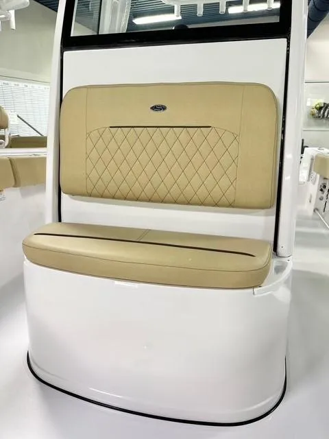 Slide: The Image of 2025 Sportsman Open 232 Center Console with beige cushioned seating. - 8