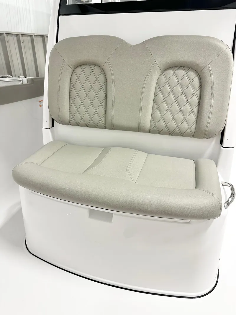 Slide: The Image of 2025 Sportsman Open 302 Center Console boat seat with cushioned backrest and modern design. - 9