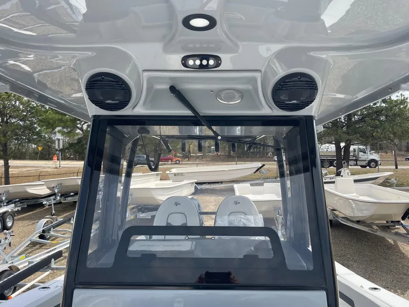 Slide: The Image of 2025 Sea Pro 262 Offshore boat interior with modern dashboard and seating. - 19