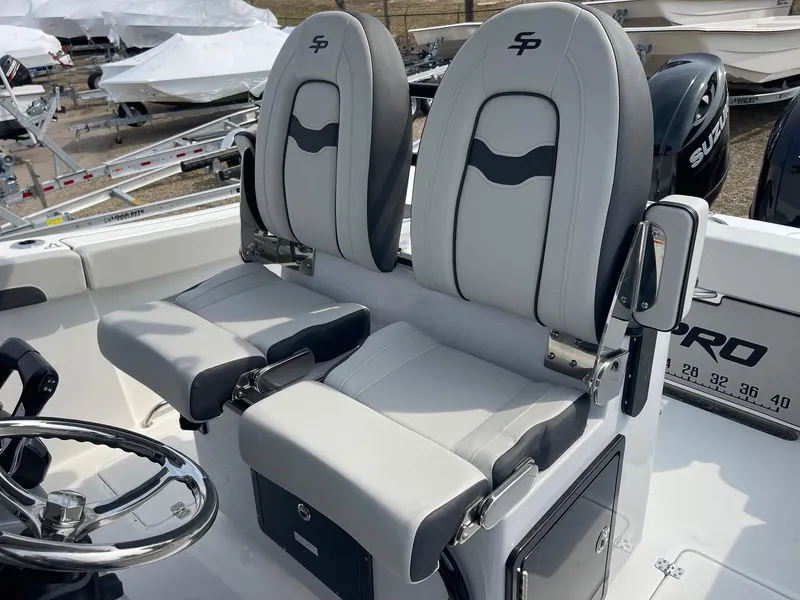 Slide: The Image of 2025 Sea Pro 262 Offshore boat seats, featuring dual gray and black cushioned chairs. - 22