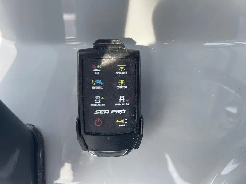 Slide: The Image of Control panel of 2025 Sea Pro 262 Offshore boat with various function buttons. - 35