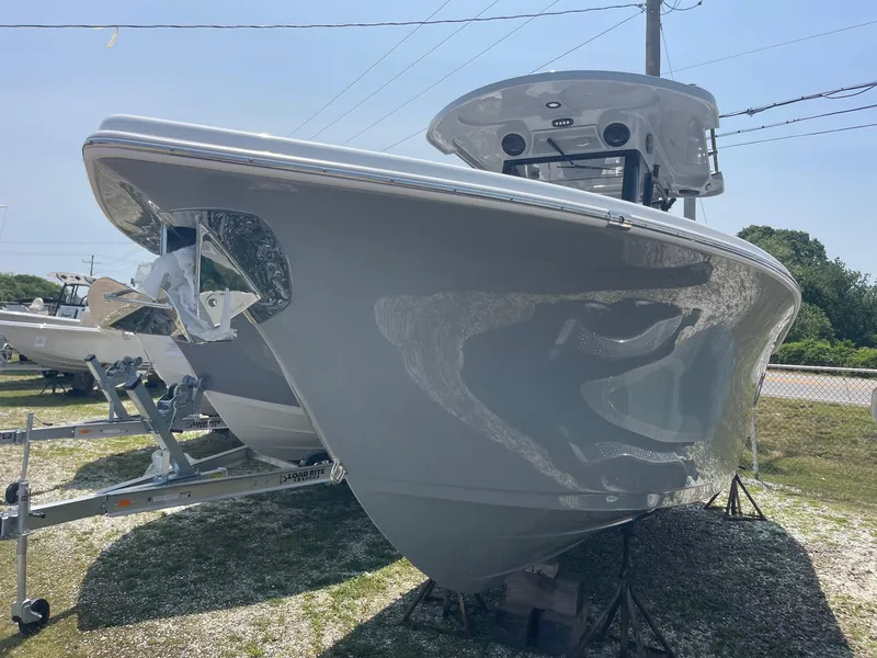 Slide: The Image of 2025 Sea Pro 262 Offshore boat displayed outdoors on a sunny day. - 4