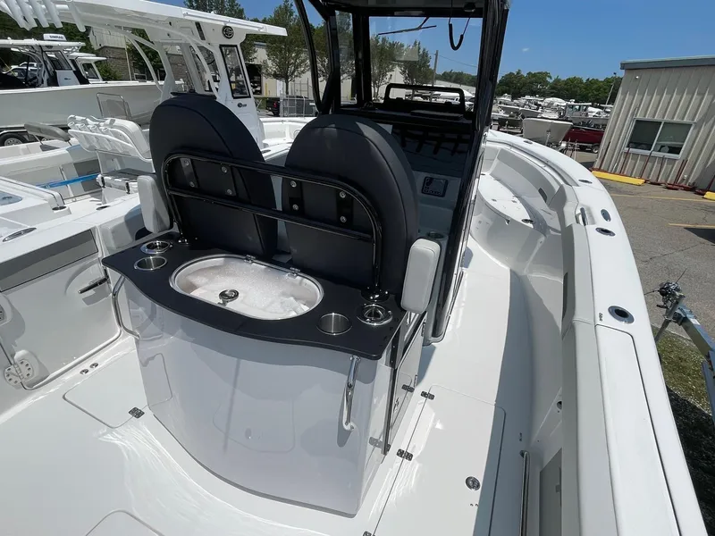 Slide: The Image of 2025 Sea Pro 262 Offshore boat interior with seating and console. - 42