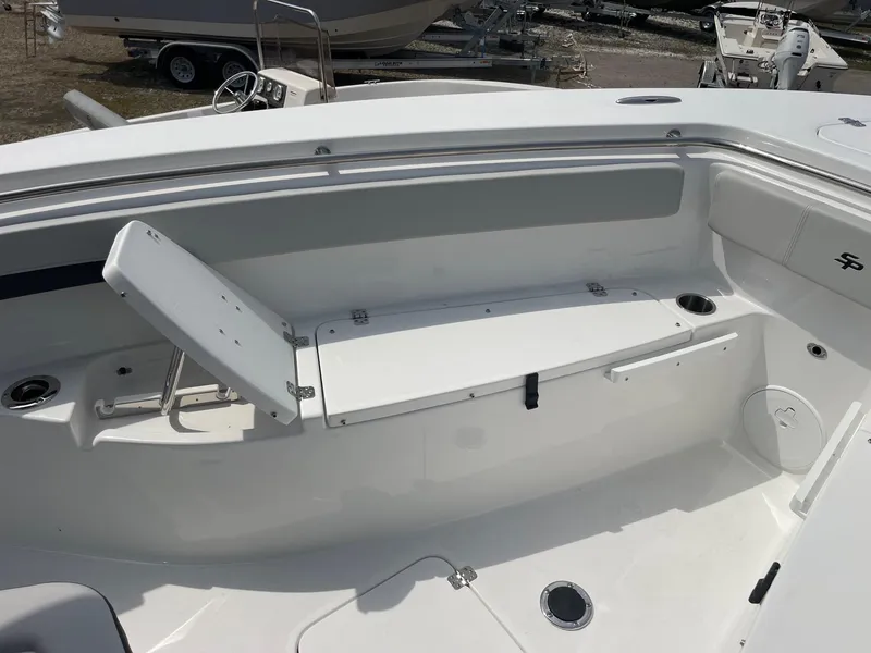 Slide: The Image of 2025 Sea Pro 262 Offshore boat interior with seating and storage compartments. - 48