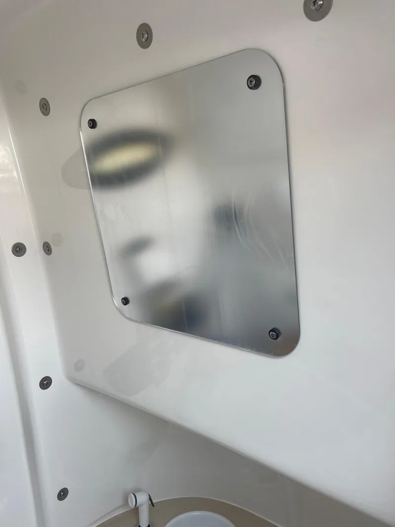 Slide: The Image of 2025 Sea Pro 262 Offshore boat interior with metal panel detail. - 56