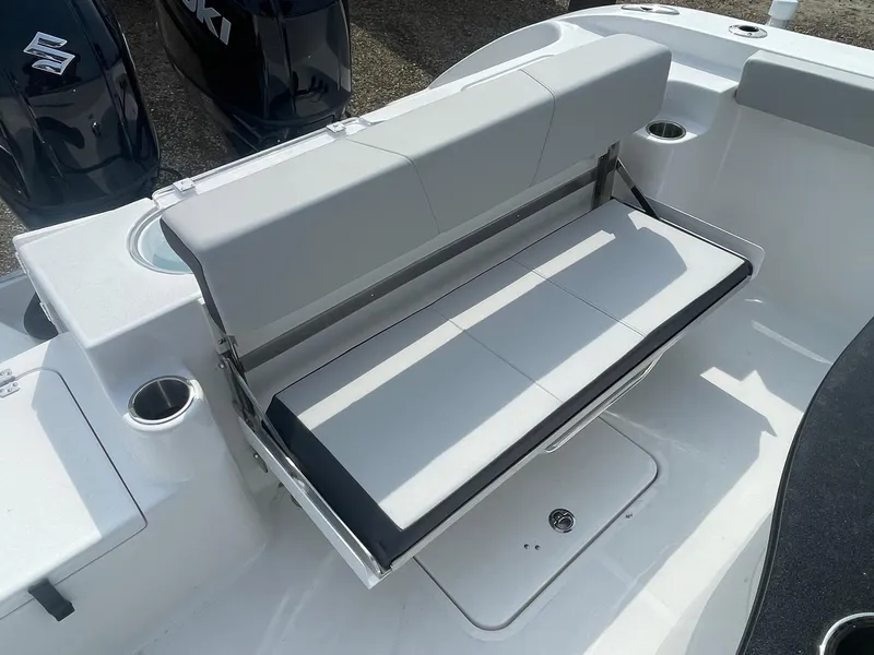 Slide: The Image of 2025 Sea Pro 262 Offshore boat with foldable seating and cup holders. - 70