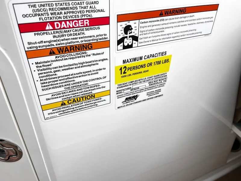 Slide: The Image of Safety warnings and capacity limits on a 2022 Sea Ray SPX 210 boat. - 10