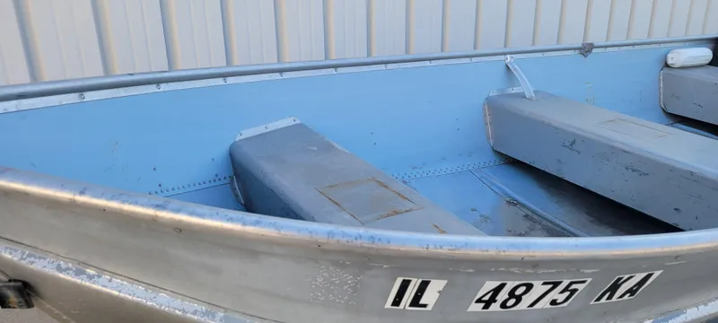 Slide: The Image of 1988 Lowe 14' V aluminum boat with registration number IL 4875 KA. - 7