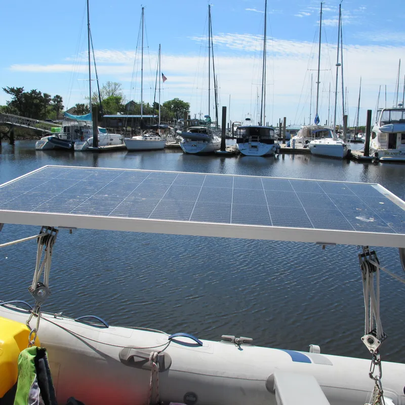 Slide: The Image of Solar panel on a 1997 Catalina 42 MkII yacht in a marina setting. - 17