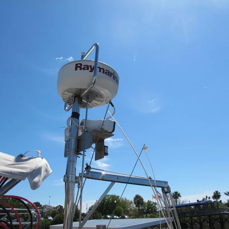 Slide: The Image of Radar equipment on a 1997 Catalina 42 MkII sailboat under clear blue sky. - 19