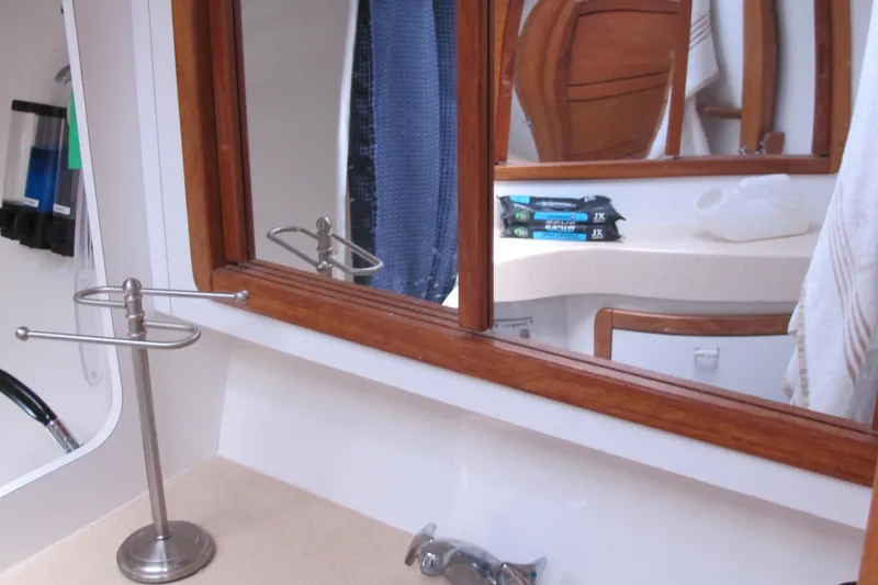 Slide: The Image of Bathroom interior of a 1997 Catalina 42 MkII yacht with mirror and sink. - 41