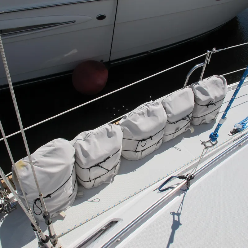 Slide: The Image of Sailboat deck with fenders on a 1997 Catalina 42 MkII. - 8