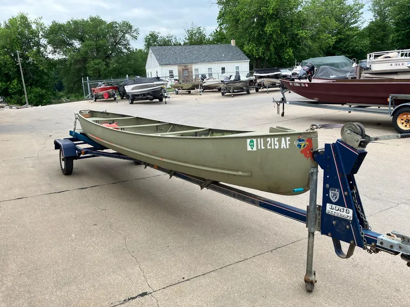 Slide: The Image of 1961 Grumman 19' Square Stern Canoe on trailer in a boatyard. - 5