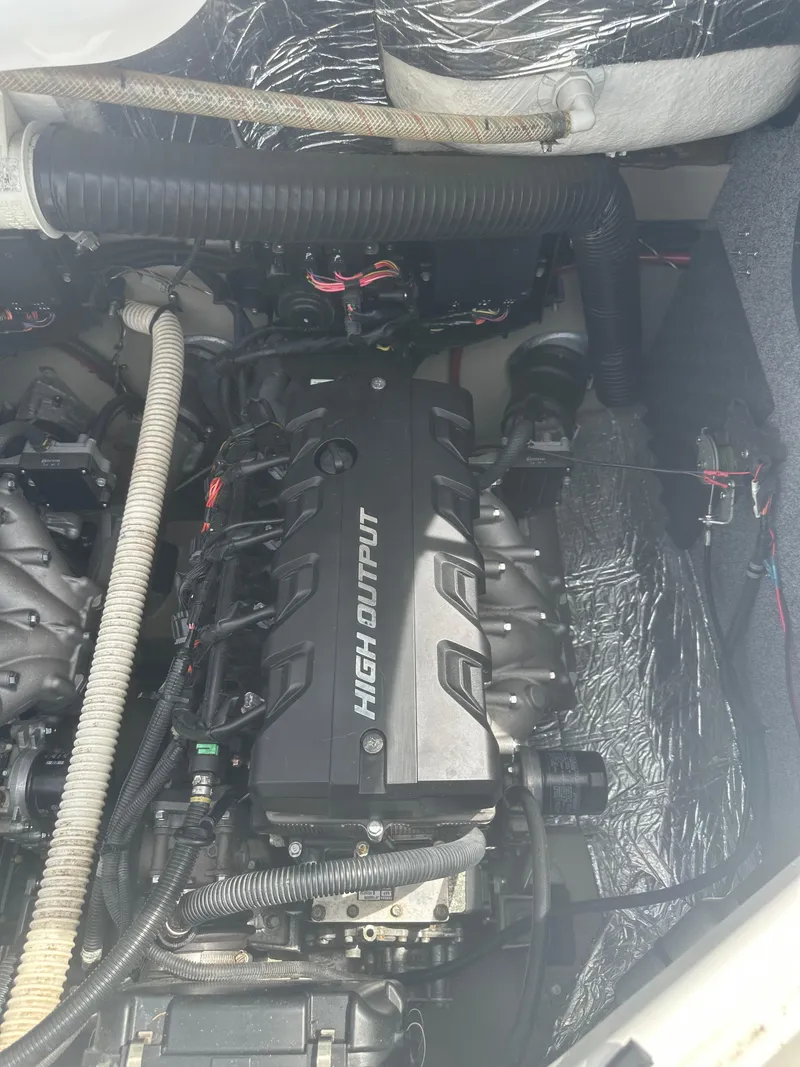 Slide: The Image of Engine compartment of 2013 Yamaha Boats 242 Limited S with high output engine. - 19