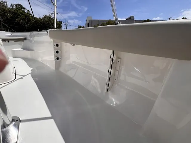 Slide: The Image of 2025 Key West 189 FS boat interior, showcasing sleek white design and modern features. - 19