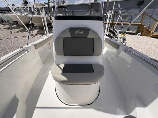 Slide: The Image of 2025 Key West 189 FS boat interior with cushioned seating and console. - 20