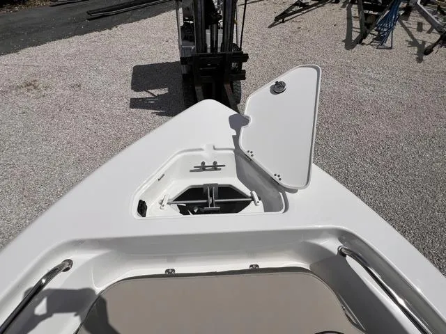 Slide: The Image of 2025 Key West 189 FS boat bow with open storage compartment. - 23