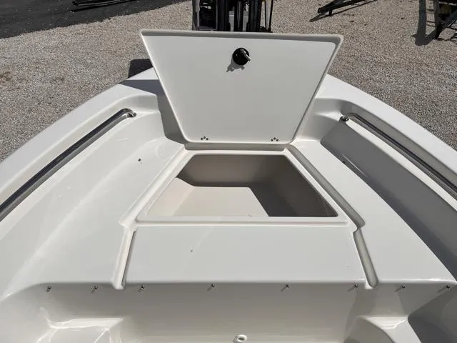 Slide: The Image of 2025 Key West 189 FS boat with open storage compartment on deck. - 24