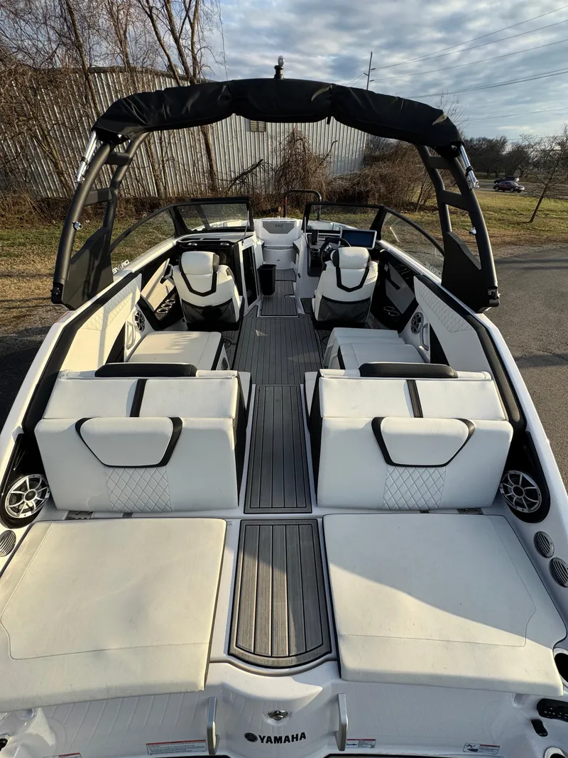Slide: The Image of 2024 Yamaha Boats 222SD interior with spacious seating and sleek design. - 2