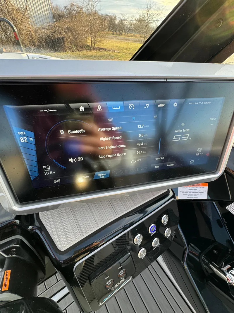 Slide: The Image of 2024 Yamaha Boats 222SD dashboard displaying digital controls and navigation features. - 5