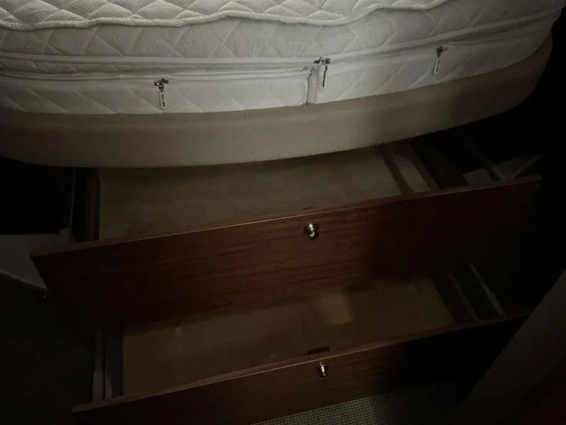 Slide: The Image of Under-bed storage drawers in a Nimbus 365 Coupe, 2025 model. - 2