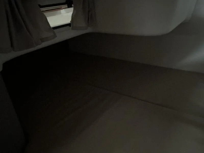Slide: The Image of Cozy interior cabin of 2025 Nimbus 365 Coupe with curtains and window. - 41