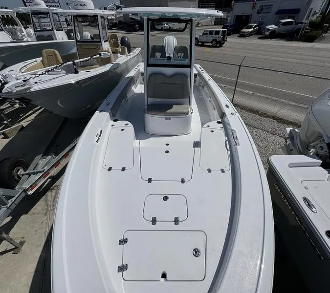 Slide: The Image of 2025 Sportsman Masters 267 boat on display at a dealership. - 7