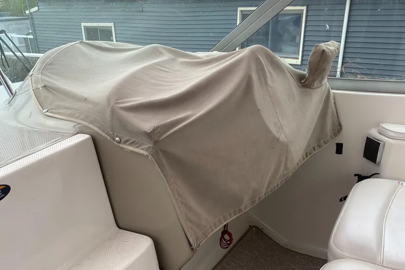 Slide: The Image of Covered dashboard of a 2000 Maxim Yachts 3300SCR boat interior. - 13