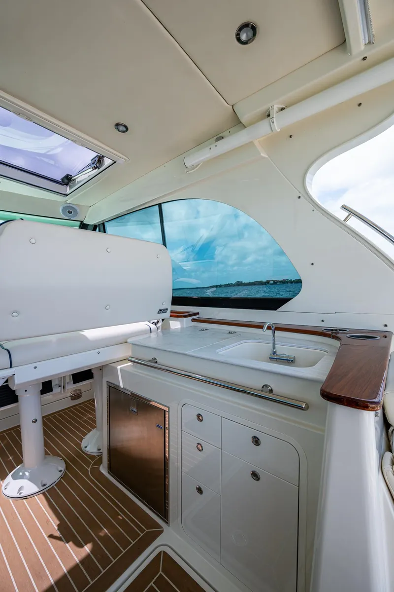 Slide: The Image of 2021 Hinckley Sport Boat 40 X interior with sleek design and modern amenities. - 13