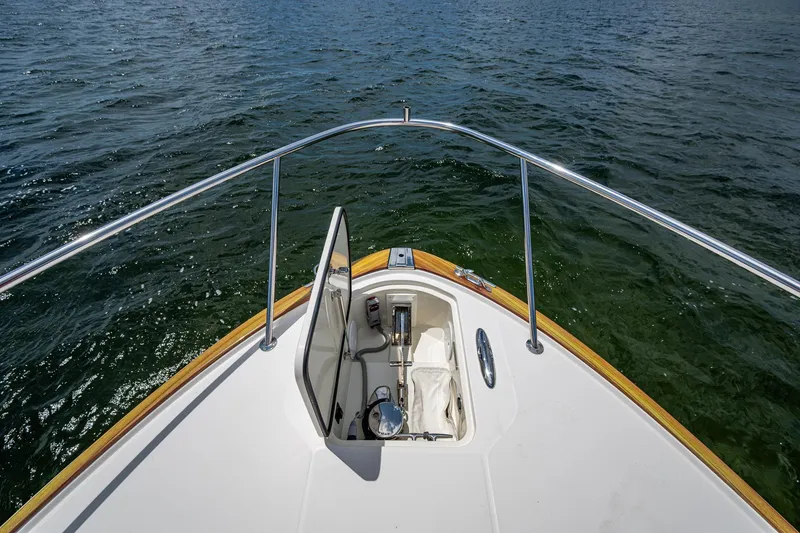 Slide: The Image of Bow view of 2021 Hinckley Sport Boat 40 X on open water. - 29