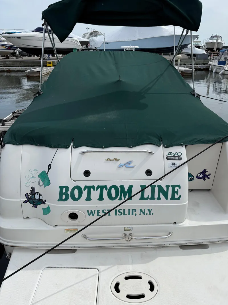 Slide: The Image of Sea Ray 240 Sundancer 2000 boat named "Bottom Line" docked in West Islip, NY. - 5