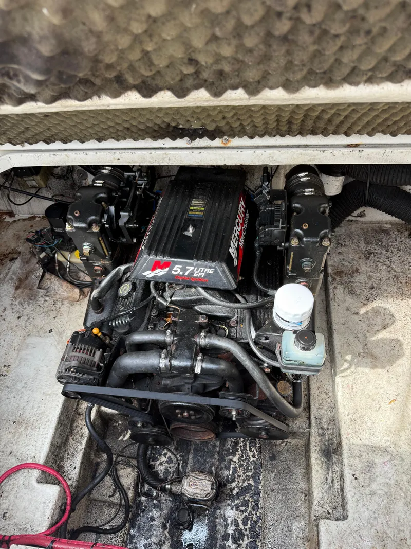 Slide: The Image of Engine compartment of a 2000 Sea Ray 240 Sundancer boat. - 7