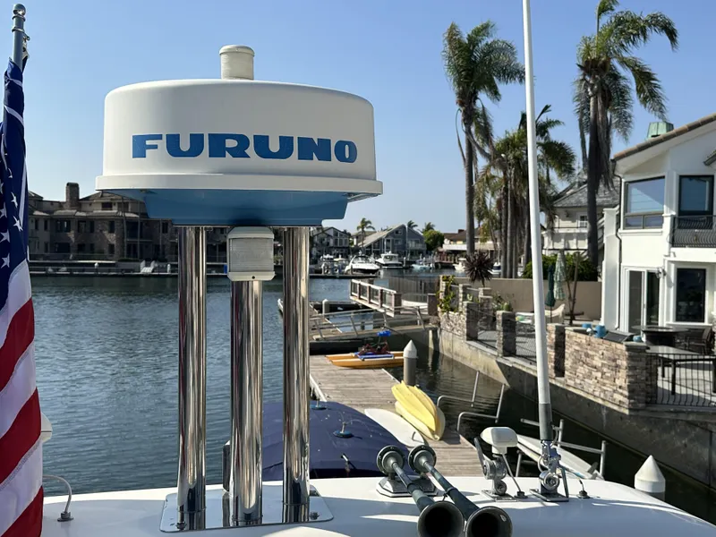 Slide: The Image of Azimut 54 yacht with Furuno radar, docked in a scenic marina, 1996 model. - 39