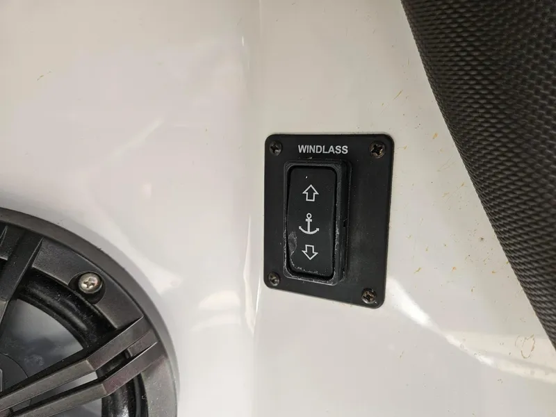 Slide: The Image of Windlass control switch on 2015 Cobalt R3 boat dashboard. - 7