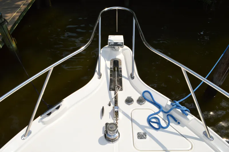 Slide: The Image of Bow of 2006 Tiara Yachts 4300 Sovran with anchor and blue rope. - 25
