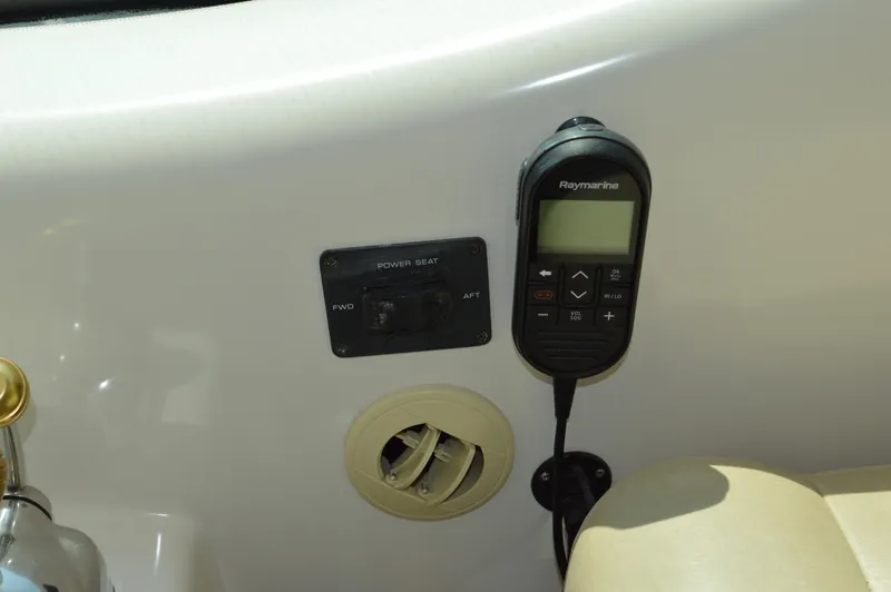 Slide: The Image of Control panel and Raymarine device on 2006 Tiara Yachts 4300 Sovran. - 33