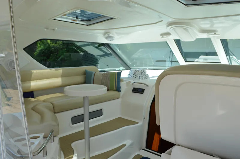 Slide: The Image of Luxurious interior of 2006 Tiara Yachts 4300 Sovran with plush seating and modern design. - 39