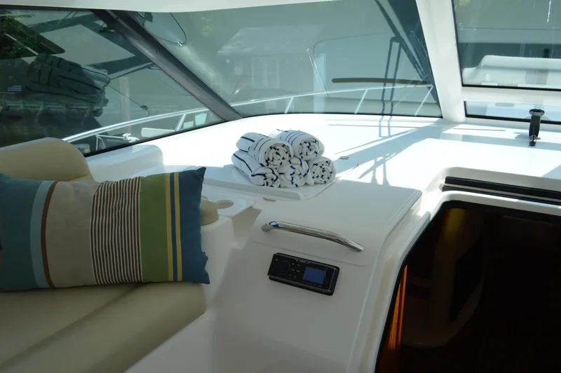 Slide: The Image of Interior of 2006 Tiara Yachts 4300 Sovran with cushions and rolled towels. - 40